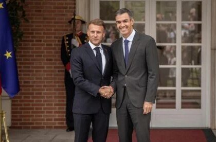 Pedro Sanchez and Emmanuel Macron pose for photos during the French president's state visit to Madrid on Wednesday, September 30, 2026.